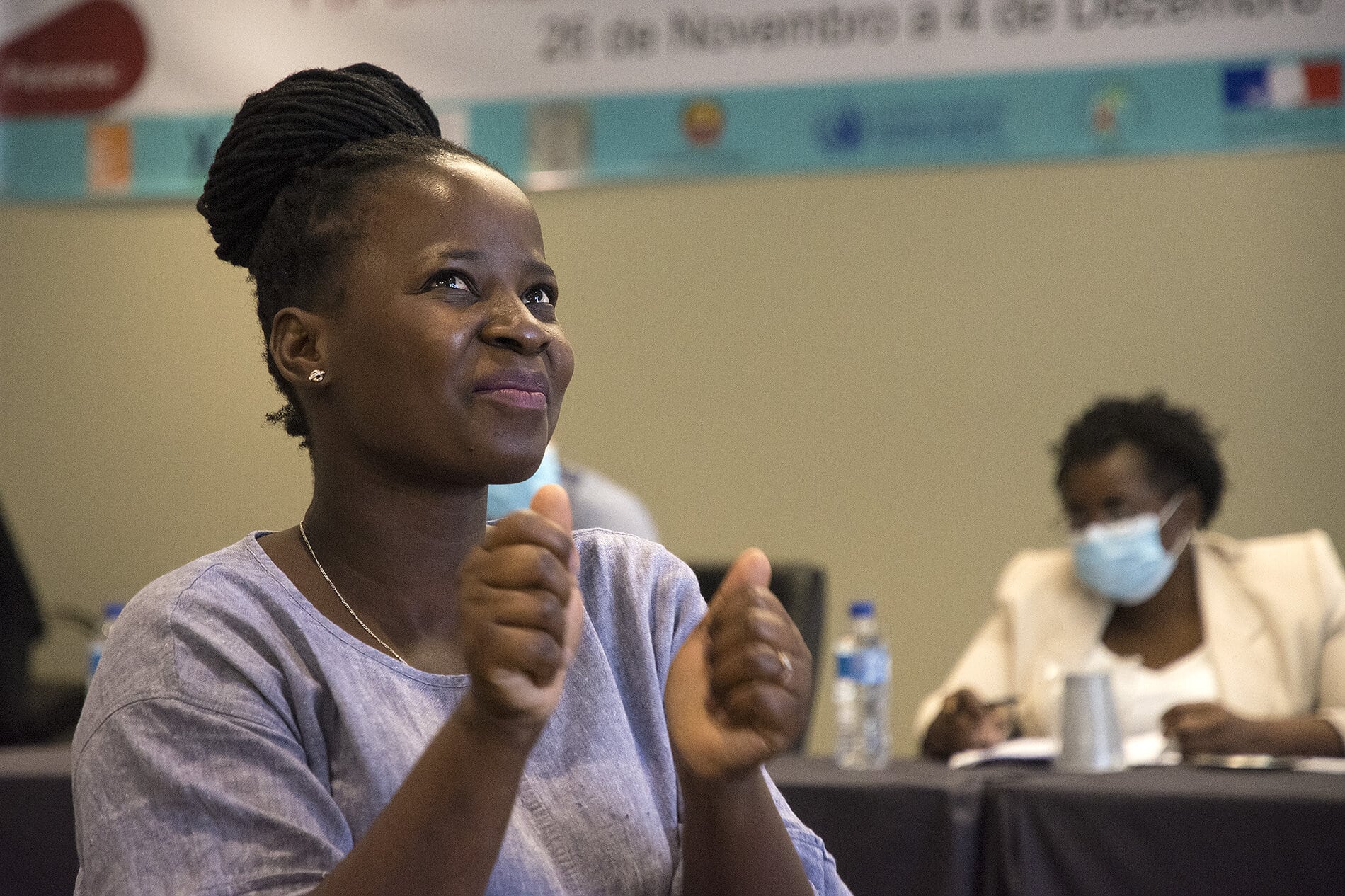 Picture of an African woman with disability at a voting center.