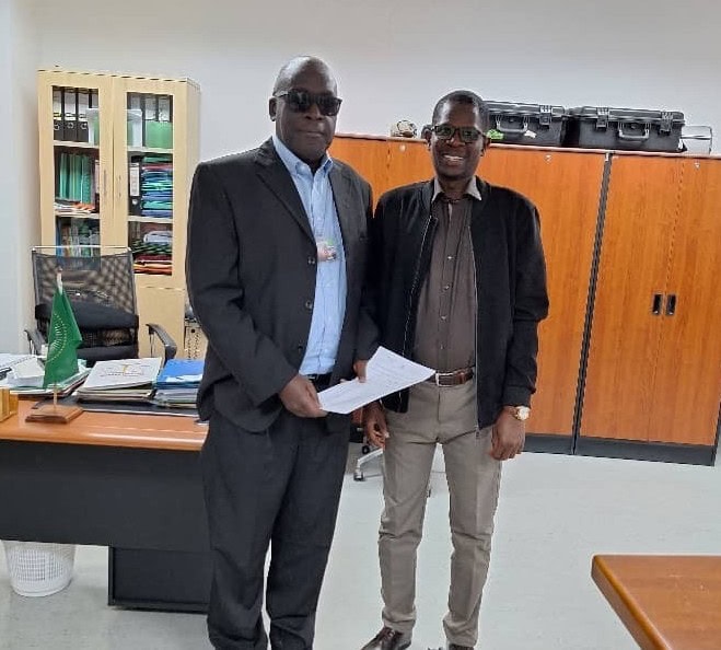 Photo of Dr. Thomas Ongolo (GIZ Regional Advisor) with Dr. Papa Mamadou Diop, a senior staff in the Office of the Legal Counsel in charge of the ratification of the ADP. He is sharing an announcement informing the Member States of the AU that the Protocol to the African Charter on Human and Peoples’ Rights on the Rights of Persons with Disabilities in Africa had entered into force. This significant milestone occurred on 3rd May 2024, following the deposit of the requisite 15th number of instruments of ratification.